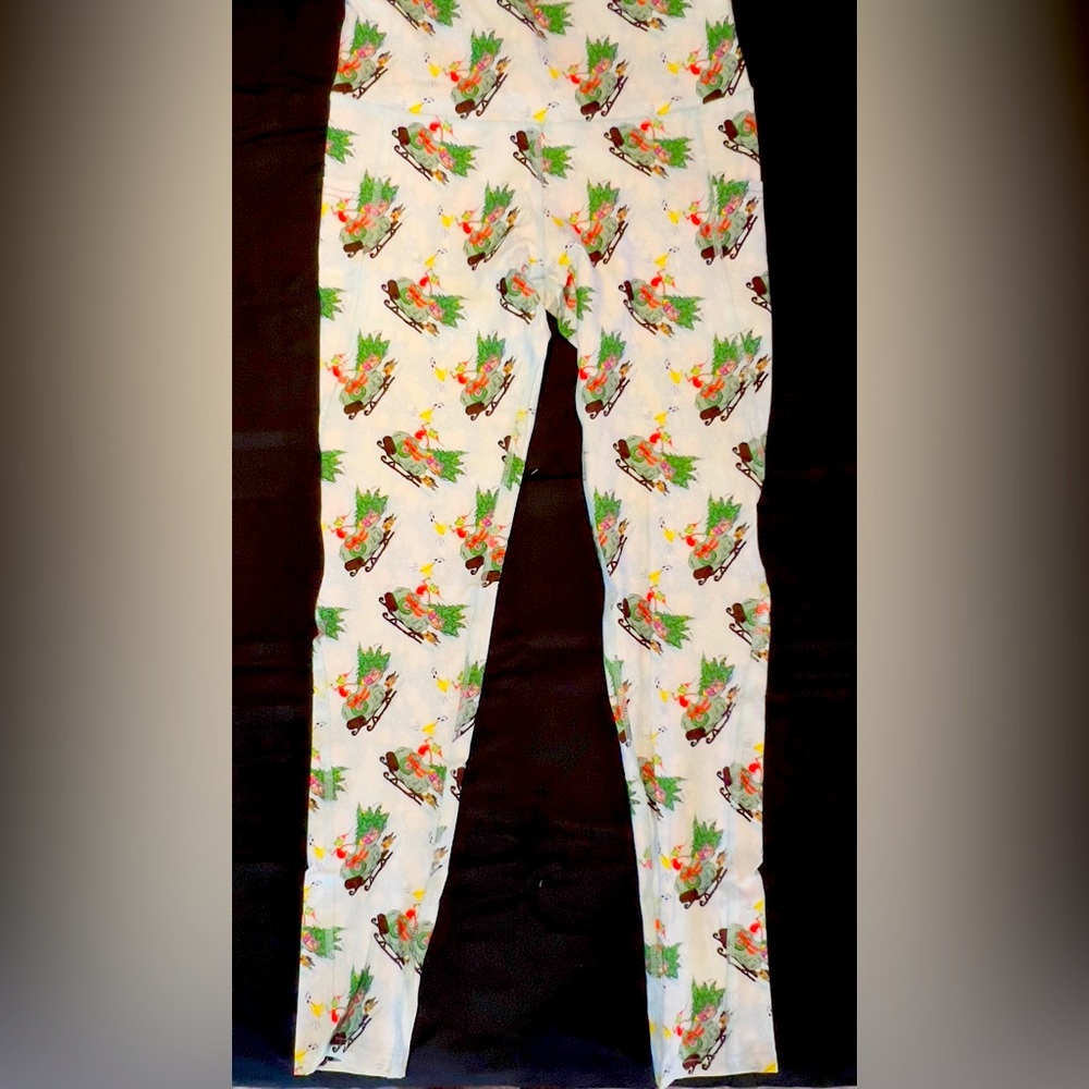 Spread the Holiday Cheer wearing a pair of The Grinch Leggings! - Picture 2 of 6